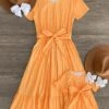 Mom & Me - Mustard Stripe Ruffle Dress 1 Mom & Me - Mustard Stripe Ruffle Dress -Children's boutique clothing IMG 2573 Edit