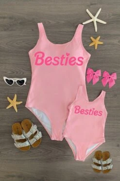 Mom & Me - "Besties" Pink One Piece Swimsuit 7 Mom & Me - "Besties" Pink One Piece Swimsuit -Children's boutique clothing IMG 7359 Edit 1e1a835a 9494 43bf aab4 e443d0479d29