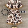 Cow Print Pom Pom Romper -Children's boutique clothing cow print pom pom romper romper sparkle in pink 29149925933130