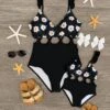 Mom & Me - Black Floral Criss-Cross One Piece Swimsuit 2 Mom & Me - Black Floral Criss-Cross One Piece Swimsuit -Children's boutique clothing mom me flower xs cut out one piece swimsuit mom me sparkle in pink 213957
